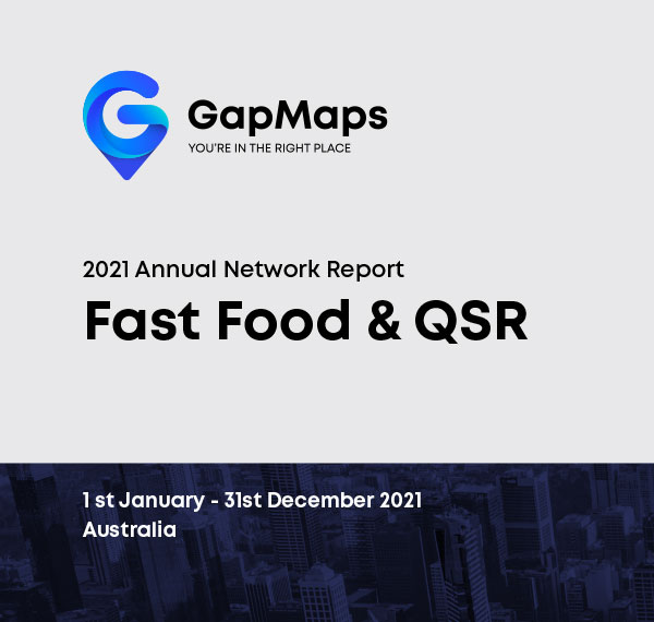 34--Network-Report-Fast-Food-&-QSR Young lady in the shopping centre holding mobile phone in the hand